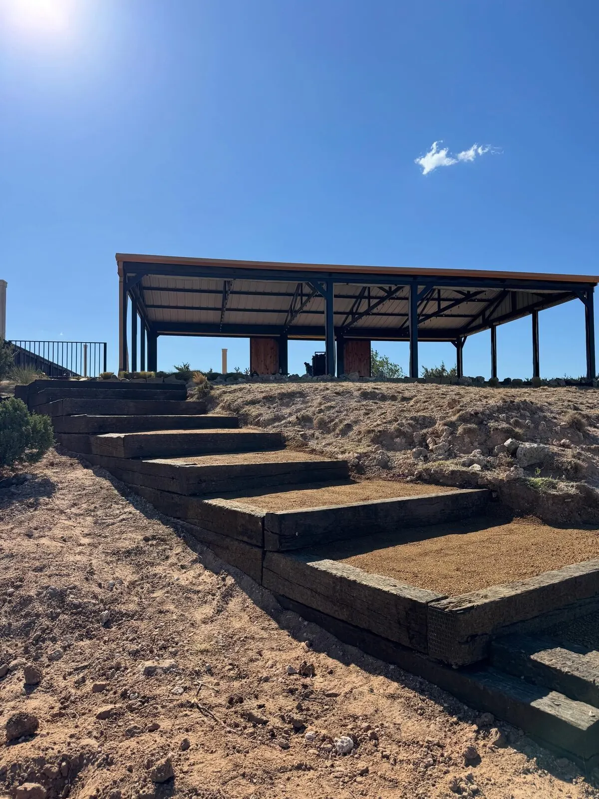 Railroad-tie steps and graded slope